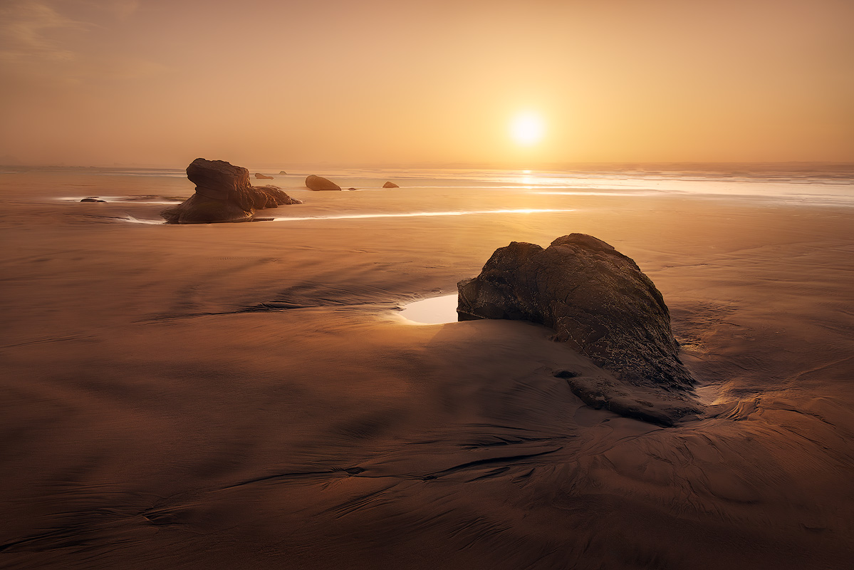 Golden hour landscape photograph with warm amber light demonstrating the best time to take outdoor photos for dramatic results