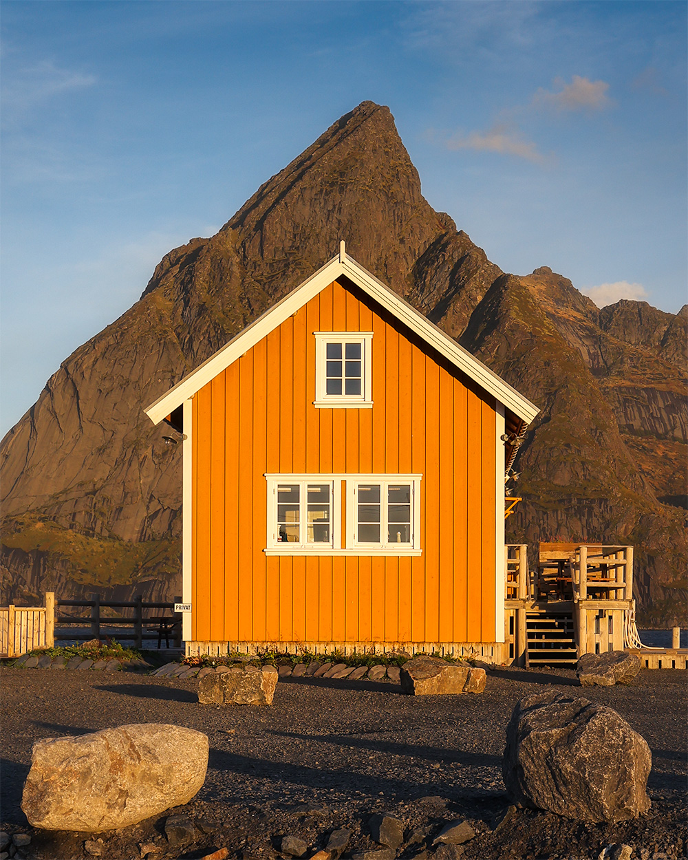 Yellow fisherman cabin in the village of Sakrisoy during sunrise