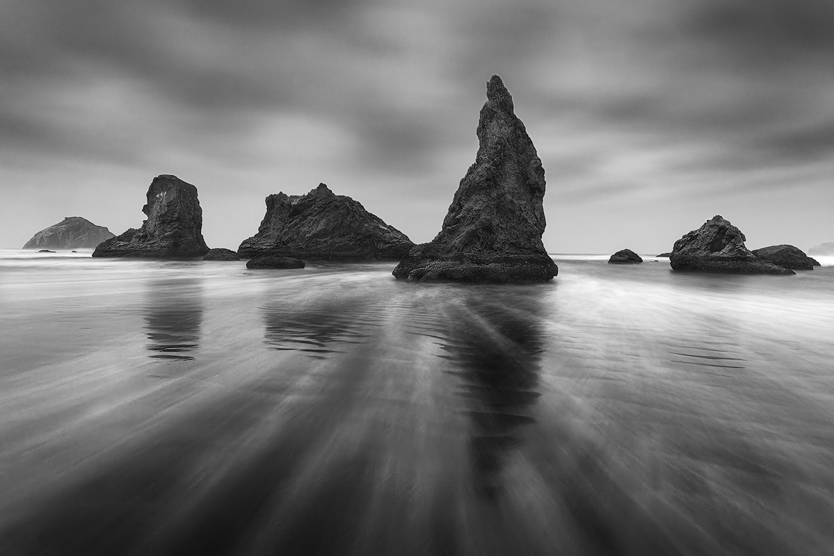 Dramatic storm landscape photograph representing perseverance through creative frustration and the breakthroughs that follow difficult periods